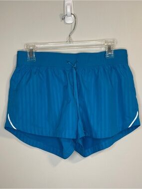 Nike Women's Teal Athletic Running Shorts with Reflective Trim